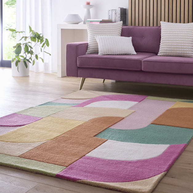 Origins Retro Deco Pink  rug UK – Size main – non-slip • washable • luxury • premium quality • soft touch fabric • British home décor • fast UK delivery • Phoenox Textiles – Our Retro Deco design is made up of carved curved shapes in differ